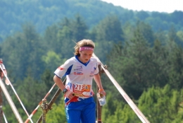 Megan running through spectator during EYOC relay., 