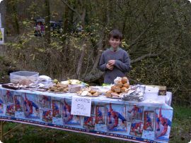 Tom Carter-Davies looking after WJS stall , 